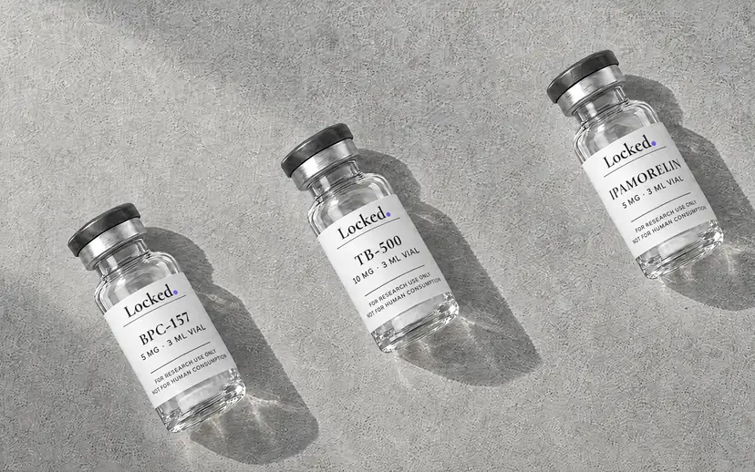 Three sealed Locked vials lying on pale paper in soft window light